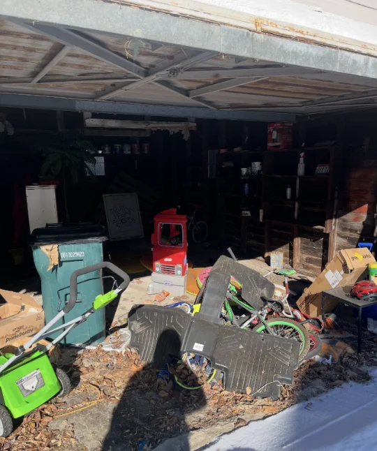 Furniture and household belongings before a garage cleanout